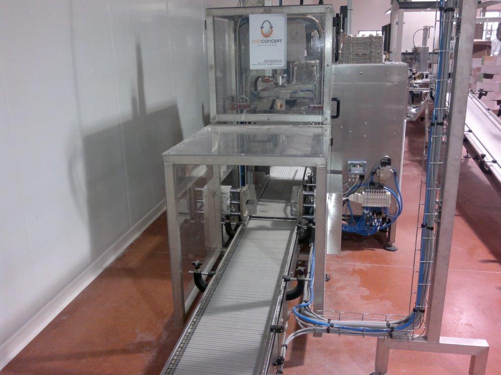 Top tray laying system